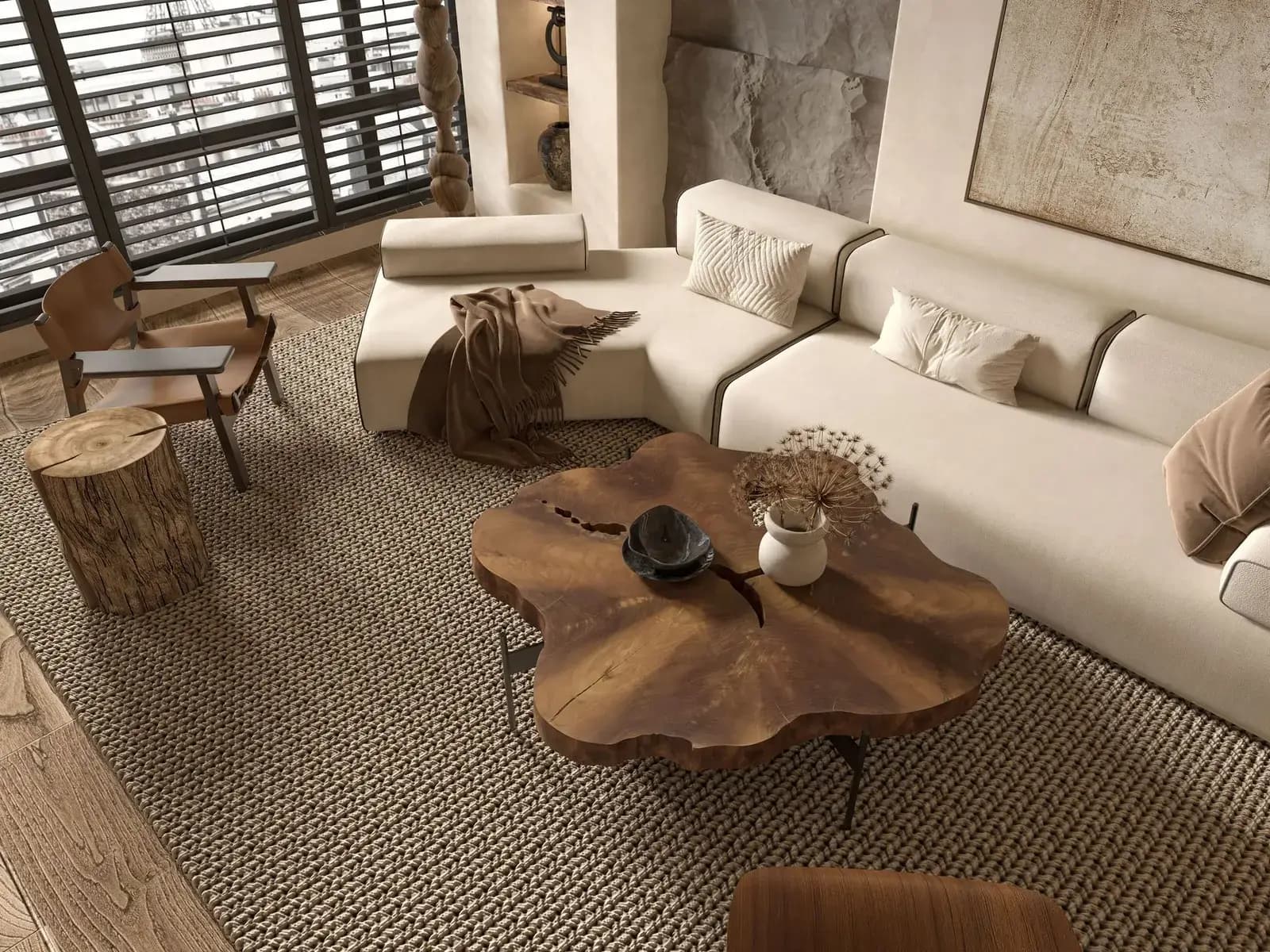 Living room with a cream sofa, a live-edge wood coffee table and a woven rug